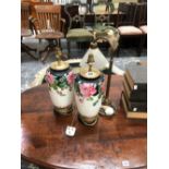 A PAIR OF VASES/LAMPS PAINTED WITH PINK ROSES, A BRASS TABLE LAMP WITH FROSTED GLASS SHADE