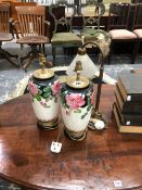 A PAIR OF VASES/LAMPS PAINTED WITH PINK ROSES, A BRASS TABLE LAMP WITH FROSTED GLASS SHADE