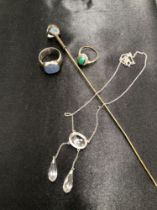 A SILVER AND 14ct GOLD SIGNED RING, A LAVALIER PENDENT A HAT PIN AND A FURTHER RING