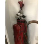 A BAG OF SIX SLAZENGER IRON GOLF CLUBS TOGETHER WITH TWO WOODS