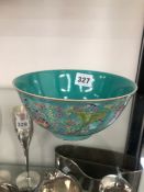 A CHINESE TURQUOISE GROUND BOWL PAINTED ON THE EXTERIOR WITH LOTUS IN FAMILLE ROSE ENAMELS, SIX