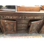 A 19th C. FRENCH OAK SIDEBOARD, THE TWO TOP DRAWERS WITH ELABORATE BRASS WORK AND ABOVE THREE