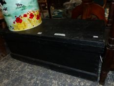 A BLACK PAINTED WOODEN TRUNK. W 94 x D 41 x H 36cms.