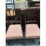 A PAIR OF LATE VICTORIAN MAHOGANY CHAIRS WITH THREE BAR BACKS, DROP IN SEATS AND TAPERING SQUARE