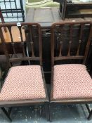 A PAIR OF LATE VICTORIAN MAHOGANY CHAIRS WITH THREE BAR BACKS, DROP IN SEATS AND TAPERING SQUARE