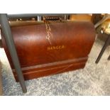 A VINTAGE SINGER SEWING MACHINE IN CARRY CASE.