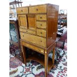 A BIEDERMEIER TASTE WRITING CABINET, THE TOP WITH SEVEN BIRDS EYE MAPLE FRONTED DRAWERS EACH WITH