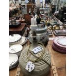 A STUDIO POTTERY TABLE LAMP TOGETHER WITH ANOTHER CHINESE JAR AND COVER AS A LAMP.