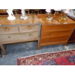 A 20th C. LIMED OAK CHEST OF TWO SHORT AND A LONG DRAWER TOGETHER WITH A CHEST EN SUITE OF THREE