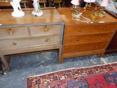 A 20th C. LIMED OAK CHEST OF TWO SHORT AND A LONG DRAWER TOGETHER WITH A CHEST EN SUITE OF THREE