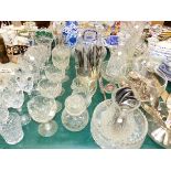 A QUANTITY OF CUT GLASS INC. DECANTERS, BOWLS AND GLASSES AND VARIOUS PLATED CUTLERY.