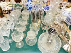 A QUANTITY OF CUT GLASS INC. DECANTERS, BOWLS AND GLASSES AND VARIOUS PLATED CUTLERY.