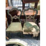 A PAIR OF 19th C. GREEN PAINTED ROCOCO BALLOON BACKED CHAIRS DETAILED IN GILT ABOVE STUFFED SEATS