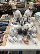 A COLLECTION OF POTTERY AND STONE WARE ANIMALS, A PAIR OF GERMAN PORCELAIN FIGURES AND A CROWN DERBY