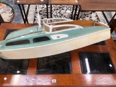 A MOTOR POWERED LAUNCH NAMED KYLIE, FROM BOW TO STERN. 110cms.