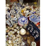 AN EXTENSIVE COLLECTION OF BLUE AND WHITE CHINA ORNAMENTS, VARIOUS MINIATURE TEAPOTS, PEWTER SPOONS,