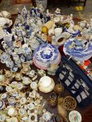 AN EXTENSIVE COLLECTION OF BLUE AND WHITE CHINA ORNAMENTS, VARIOUS MINIATURE TEAPOTS, PEWTER SPOONS,