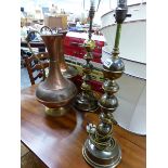 A PAIR OF BRASS LAMPS AND TWO COPPER EWERS.