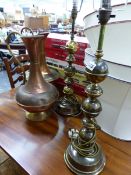 A PAIR OF BRASS LAMPS AND TWO COPPER EWERS.