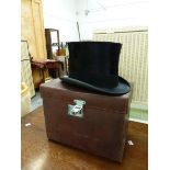 A LEATHER CASED WALTER BARNARD BLACK SILK TOP HAT, THE INTERNAL MEASUREMENTS. 21.5 x 16.5cms.