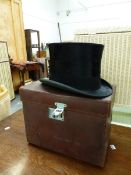 A LEATHER CASED WALTER BARNARD BLACK SILK TOP HAT, THE INTERNAL MEASUREMENTS. 21.5 x 16.5cms.