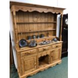 A LARGE FRENCH STYLE PINE DRESSER. 193 X 156 X 43cms.