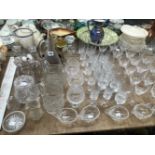 DECANTERS, JUGS, CANDLESTICKS AND DRINKING GLASS