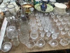 DECANTERS, JUGS, CANDLESTICKS AND DRINKING GLASS