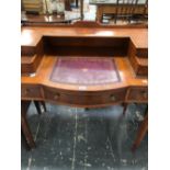 A 20th C. YEW WOOD WRITING TABLE WITH TWO DRAWERS FLANKING THE LEATHER INSET TOP ABOVE A BOW FRONT