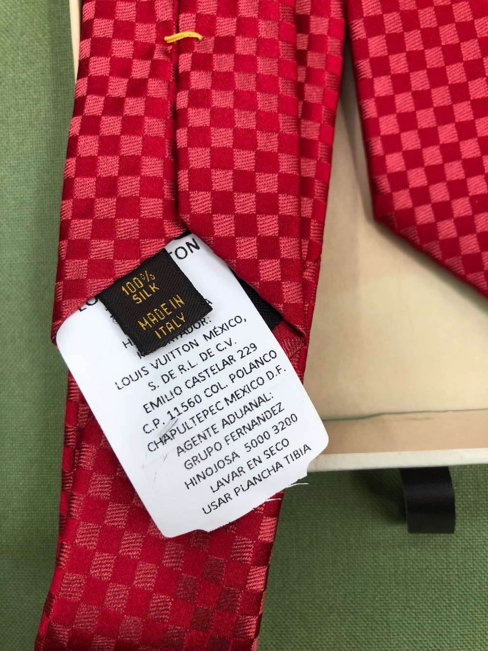 A LOUIS VUITTON RED SILK TIE. - Image 2 of 4