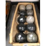 TEN CARVED STONE BALLS