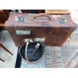 A LEATHER SUITCASE, COPPER COAL SCUTTLE AND IRON TONGS