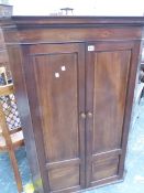 A GEORGE III SATIN WOOD BANDED AND FLORAL OVAL INLAID MAHOGANY CORNER CUPBOARD. W 84 x H 119cms.