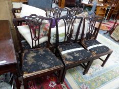 A SET OF SIX GEORGE III MAHOGANY CHAIRS, EACH WITH A GOTHIC TOP TO A THREE BAR SPLAT ABOVE AND