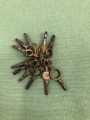 A SMALL COLLECTION OF ANTIQUE POCKET WATCH KEYS.