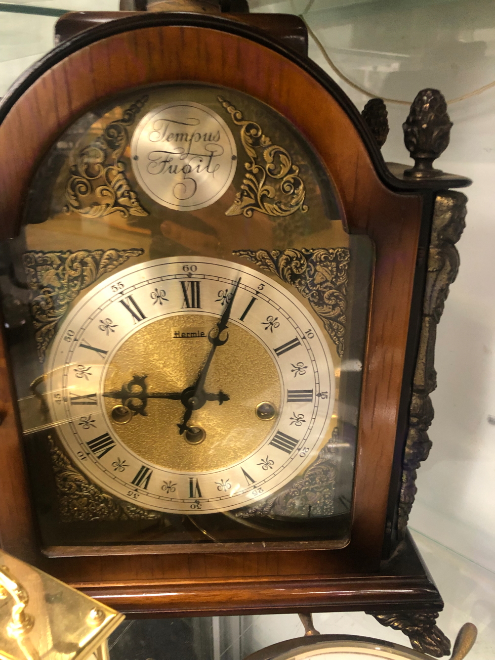 A 20th C. MANTLE CLOCK, A SEIKO CLOCK AND A SHIPS WHEEL CASED WALL CLOCK - Image 2 of 2