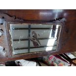 A GEORGE III MAHOGANY CUT WORK MIRROR