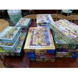 AN EXTENSIVE COLLECTION OF 1000 PIECE JIGSAW PUZZLES.