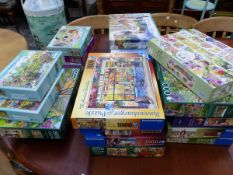 AN EXTENSIVE COLLECTION OF 1000 PIECE JIGSAW PUZZLES.