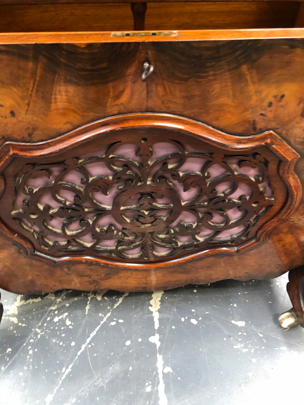 A VICTORIAN WALNUT LIDDED TWO COMPARTMENT CANTERBURY WITH A FRET WORK PANEL TO BOTH BROAD SIDES. W - Image 3 of 3