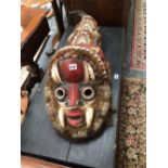 A LATE 19th C. CHOKROBA, BURKINO FASO MASK AND HEADRESS, THE RED FACE WITH WHITE FANGS, THE BACK