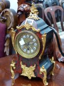 A BOULLE CASED MANTEL TIMEPIECE