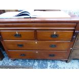 A VICTORIAN MAHOGANY CHEST OF TWO SHORT AND TWO LONG DRAWERS ON BUN FEET. W 135 x D 57 x H 100cms.