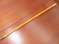 AN ANTIQUE SILVER MOUNTED MALLACCA WALKING CANE.