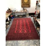 AN AFGHAN CARPET 301 x 205cms