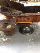 A CHILDS CRADLE, A LEATHER TOP HAT BOX AND A WWII HELMET