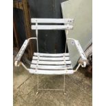 A FOLDING PATIO ARMCHAIR