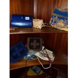 A SMALL COLLECTION OF VINATGE HANDBAGS AND A QUANTITY OF VARIOUS LADIES LEATHER GLOVES.