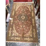 AN ORIENTAL RUG OF PERSIAN DESIGN. 164 x 93cms