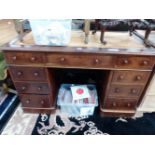 A LATE 19th C. MAHOGANY PEDESTAL DESK WITH THE KNEEHOLE DRAWER FLANKED BY BANKS OF FOUR DRAWERS ON
